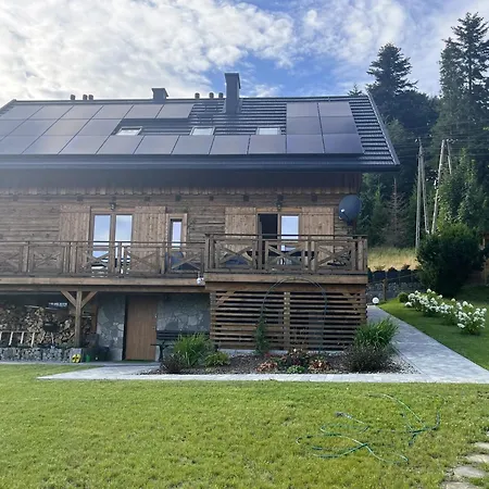 U Lampiarza بيت للعطل